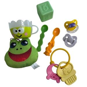 8-Piece baby doll accessory bundle with frog cup plush toy, pacifiers & spoons